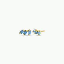 Load image into Gallery viewer, Pair of gold earrings with blue stones on a white background