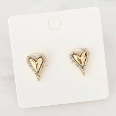 Gold heart-shaped earrings on a Lou & Co branded card.