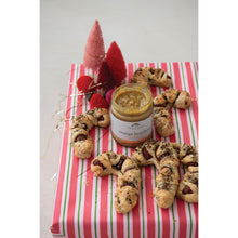 Load image into Gallery viewer, Cookies arranged around a jar of orange butter on a striped cloth with Christmas decorations.